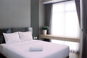 Modern Look and Restful Studio at 32th Floor Vasanta Innopark Apartment By Travelio